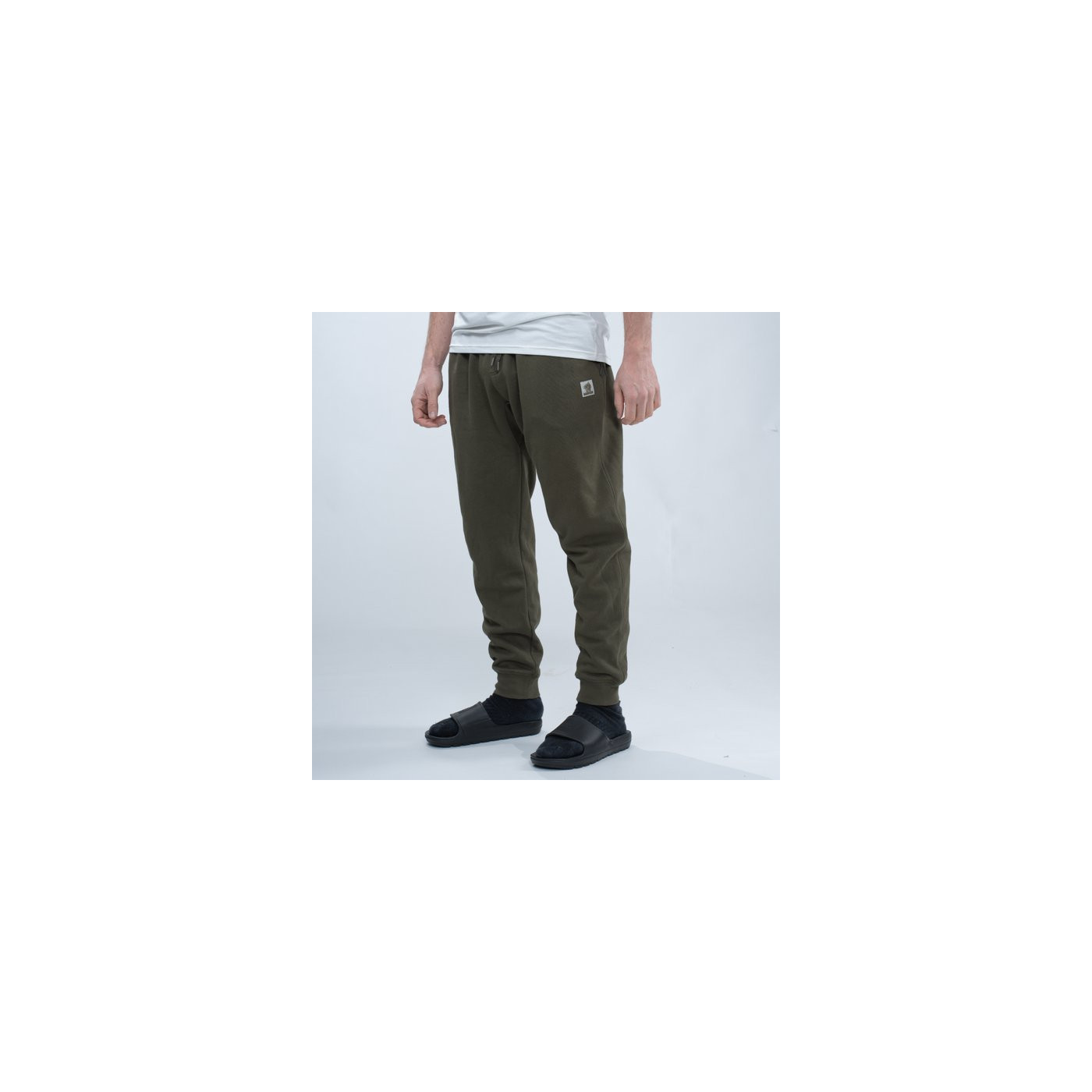 Spodnie Nash Make It Happen Badge Joggers - Green Roz.XXL - Centrum wędkarskie - Sklep wędkarski Jarofishing Spodnie Nash Make It Happen Badge Joggers - Green Roz.XXL - Centrum wędkarskie - Sklep wędkarski Jarofishing
